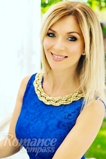 Ukrainian mail order bride Olesia from Kiev with blonde hair and blue eye color - image 1