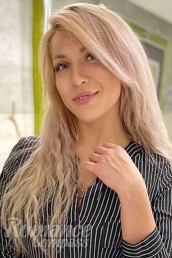 Ukrainian mail order bride Aleksandra from Gomel with blonde hair and grey eye color - image 1