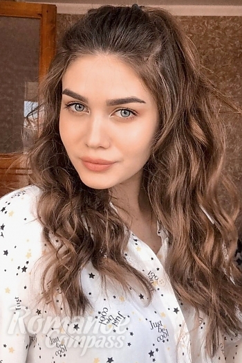 Ukrainian mail order bride Ustyna from Stara Zagora with light brown hair and blue eye color - image 1