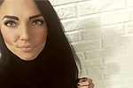 Ukrainian mail order bride Ganna from Kharkov with black hair and green eye color - image 3