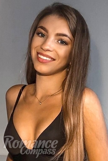 Ukrainian mail order bride Katerina from Warsaw with light brown hair and green eye color - image 1