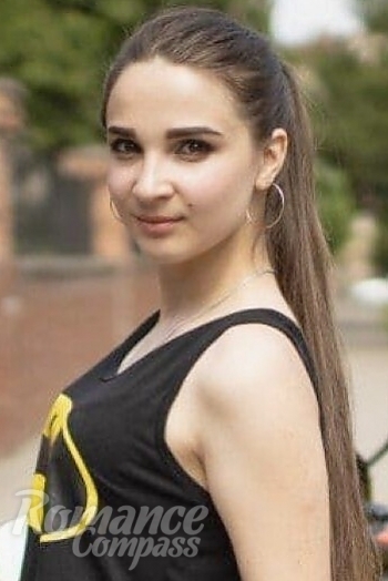 Ukrainian mail order bride Olga from Chernivtsi with brunette hair and hazel eye color - image 1