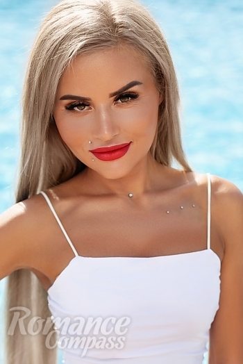 Ukrainian mail order bride Tatiana from Sumy with blonde hair and hazel eye color - image 1