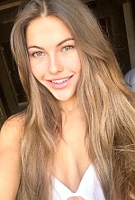 Ukrainian mail order bride Sofia from Bali with light brown hair and green eye color - image 4