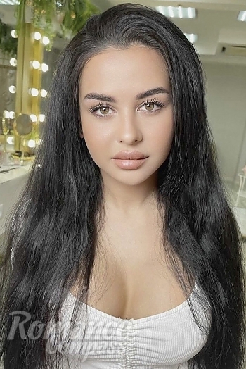 Ukrainian mail order bride Alena from Perm with black hair and hazel eye color - image 1