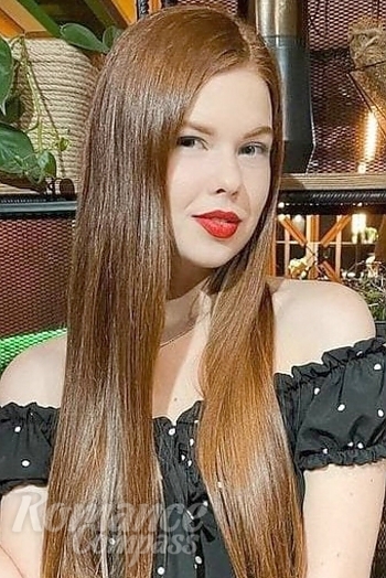 Ukrainian mail order bride Olga from Mariupol with red hair and green eye color - image 1