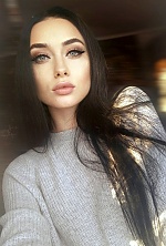 Ukrainian mail order bride Anna from Kiev with black hair and green eye color - image 4