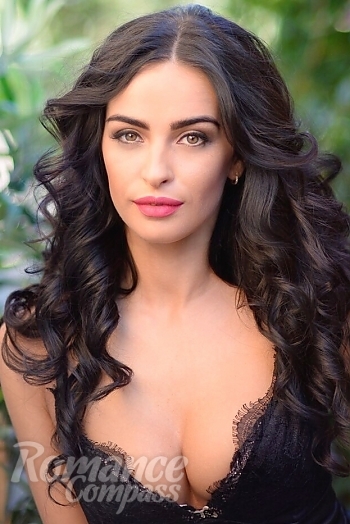 Ukrainian mail order bride Angelina from Kharkiv with black hair and green eye color - image 1