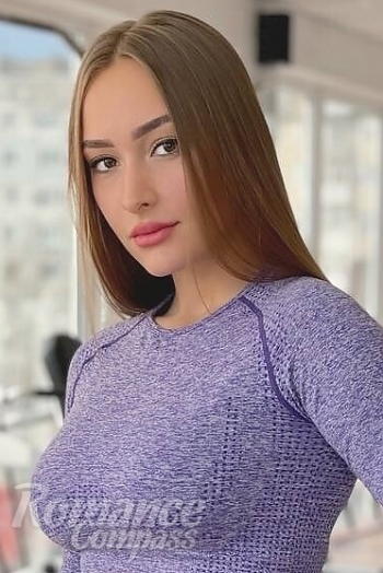 Ukrainian mail order bride Liudmyla from Kiev with light brown hair and green eye color - image 1