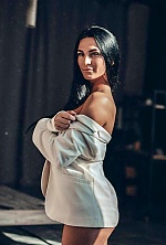 Ukrainian mail order bride Yana from Kiev with black hair and green eye color - image 5