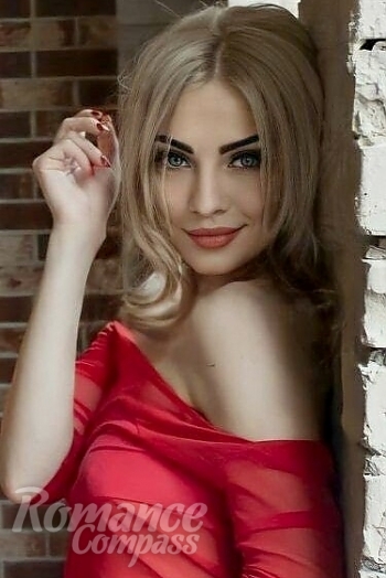 Ukrainian mail order bride Zhanna from Kiev with blonde hair and blue eye color - image 1