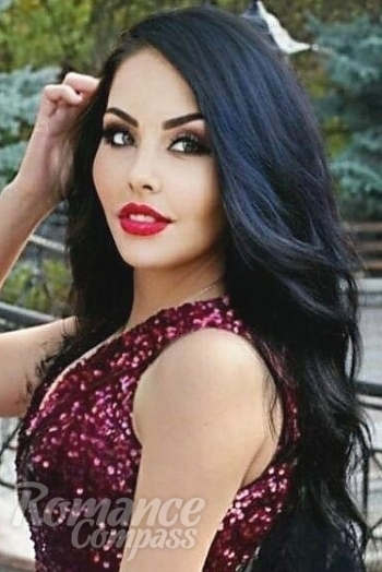 Ukrainian mail order bride Alla from Kiev with black hair and green eye color - image 1