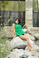 Ukrainian mail order bride Marina from Poltava with black hair and green eye color - image 6