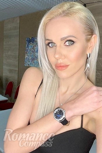 Ukrainian mail order bride Nadia from Kiev with blonde hair and blue eye color - image 1