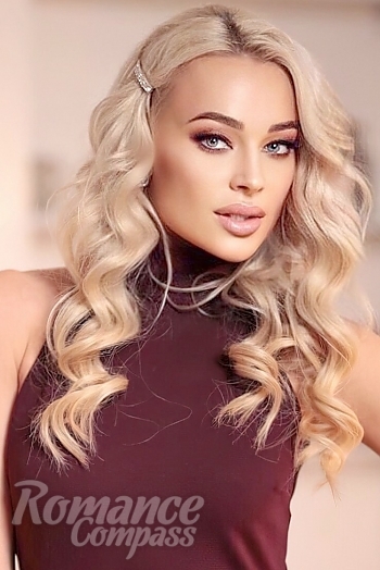 Ukrainian mail order bride Yana from Kiev with blonde hair and blue eye color - image 1