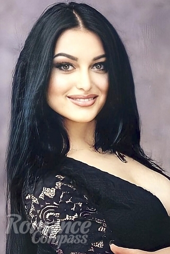 Ukrainian mail order bride Alina from Poltava with black hair and green eye color - image 1