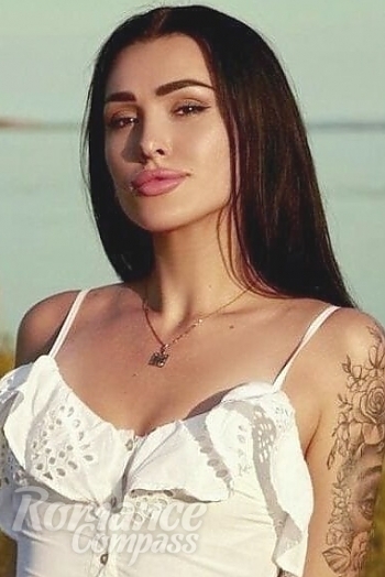 Ukrainian mail order bride Karina from Mariupol with black hair and brown eye color - image 1