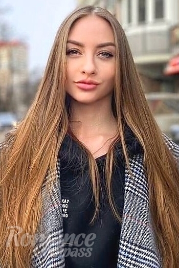 Ukrainian mail order bride Elena from Kiev with light brown hair and blue eye color - image 1