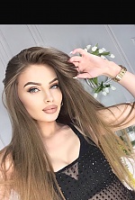 Ukrainian mail order bride Olga from Lviv with light brown hair and green eye color - image 8