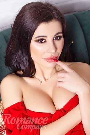 Ukrainian mail order bride Anna from Odessa with black hair and hazel eye color - image 1