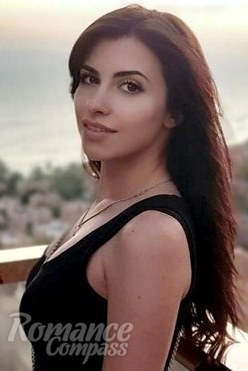 Ukrainian mail order bride Anastasia from Odessa with black hair and brown eye color - image 1