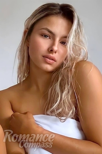 Ukrainian mail order bride Kristine from Riga with blonde hair and brown eye color - image 1