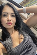Ukrainian mail order bride Andriana from Lvov with black hair and hazel eye color - image 3