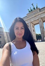 Ukrainian mail order bride Andriana from Lvov with black hair and hazel eye color - image 12