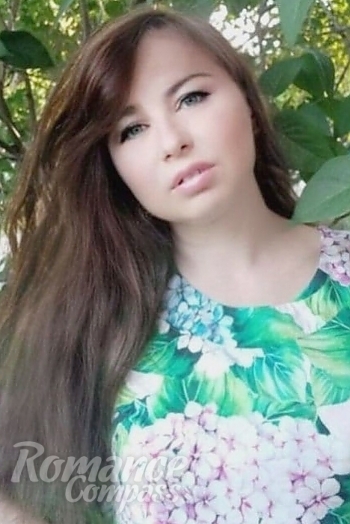 Ukrainian mail order bride Olha from Luhansk with auburn hair and grey eye color - image 1