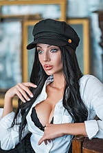 Ukrainian mail order bride Anastasia from Kurgan with black hair and blue eye color - image 3