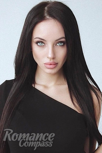 Ukrainian mail order bride Anastasia from Kurgan with black hair and blue eye color - image 1
