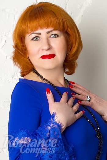 Ukrainian mail order bride Elena from Kharkov with red hair and blue eye color - image 1
