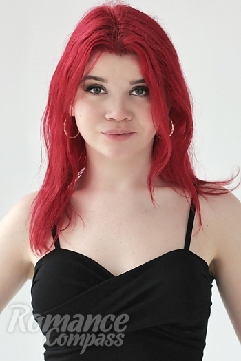 Ukrainian mail order bride Snezhana from Luhansk with red hair and brown eye color - image 1