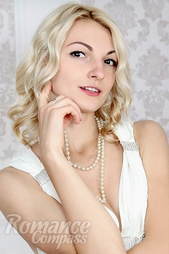 Ukrainian mail order bride Maria from Lisichansk with blonde hair and black eye color - image 1