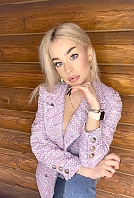 Ukrainian mail order bride Valeriia from Kiev with blonde hair and green eye color - image 11