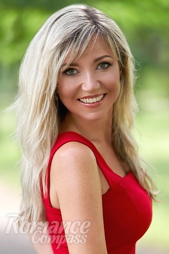 Ukrainian mail order bride Oksana from Nikolaev with blonde hair and green eye color - image 1