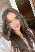 Ukrainian mail order bride Daria from Kremenchug with black hair and brown eye color - image 9