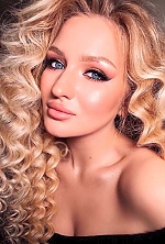 Ukrainian mail order bride Nadezhda from Kiev with blonde hair and blue eye color - image 2