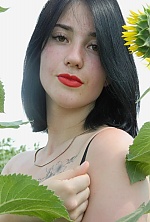 Ukrainian mail order bride Ella from Kharkov with black hair and brown eye color - image 36