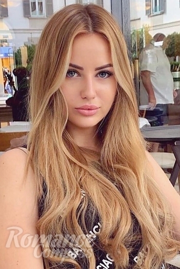 Ukrainian mail order bride Kristina from Kiev with light brown hair and blue eye color - image 1