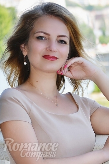 Ukrainian mail order bride Yaroslava from Khmelnitskiy with light brown hair and grey eye color - image 1