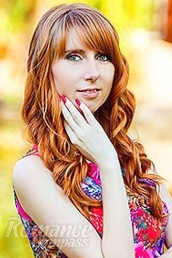 Ukrainian mail order bride Darya from Lugansk with red hair and blue eye color - image 1
