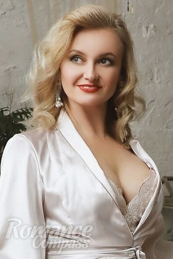 Ukrainian mail order bride Irina from Kyiv with blonde hair and blue eye color - image 1