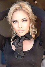 Ukrainian mail order bride Tamar from Tbilisi with blonde hair and blue eye color - image 2