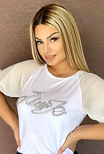 Ukrainian mail order bride Milica from Belgrade with blonde hair and black eye color - image 5