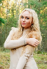 Ukrainian mail order bride Olga from Kiev with blonde hair and blue eye color - image 2