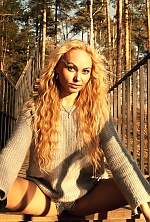 Ukrainian mail order bride Olga from Kiev with blonde hair and blue eye color - image 3