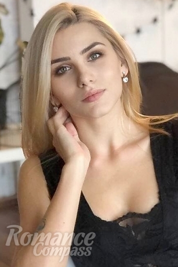 Ukrainian mail order bride Julia from Nikolaev with blonde hair and green eye color - image 1