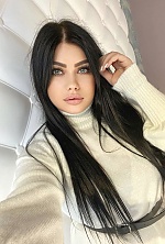 Ukrainian mail order bride Maria from Khmelnitsky with black hair and green eye color - image 6