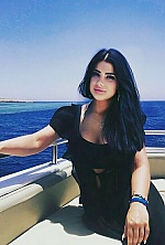 Ukrainian mail order bride Maria from Khmelnitsky with black hair and green eye color - image 11